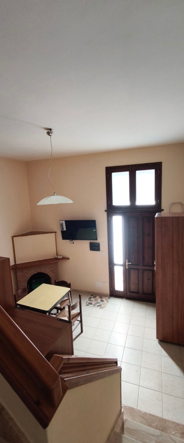 Cucina e zona pranzo al piano terra di Vicolo Corner Home a Baiano